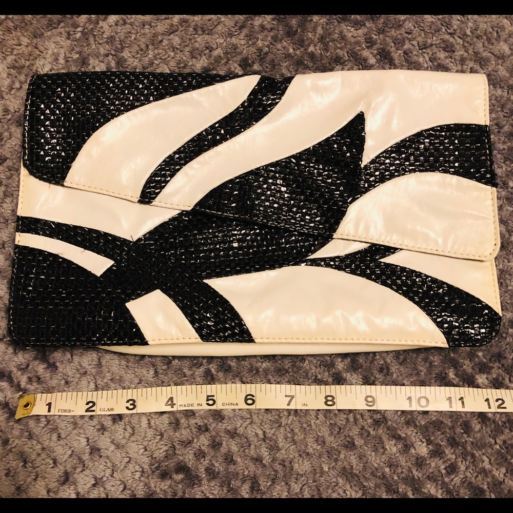 Black and white leather clutch